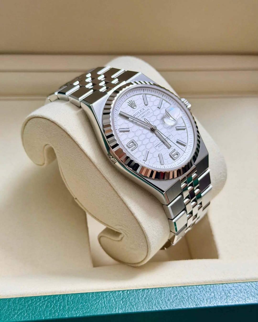 May be an image of wrist watch and text
