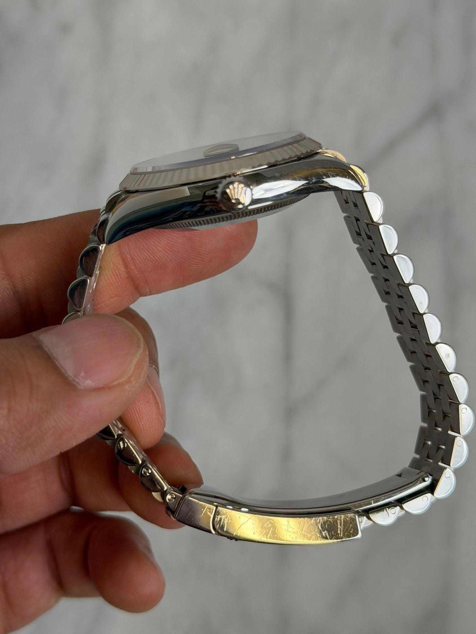 May be an image of wrist watch