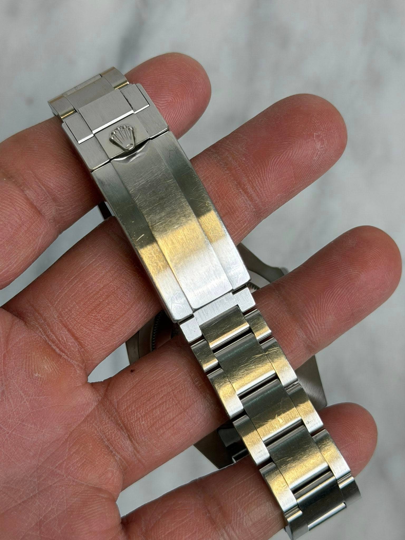 May be an image of wrist watch