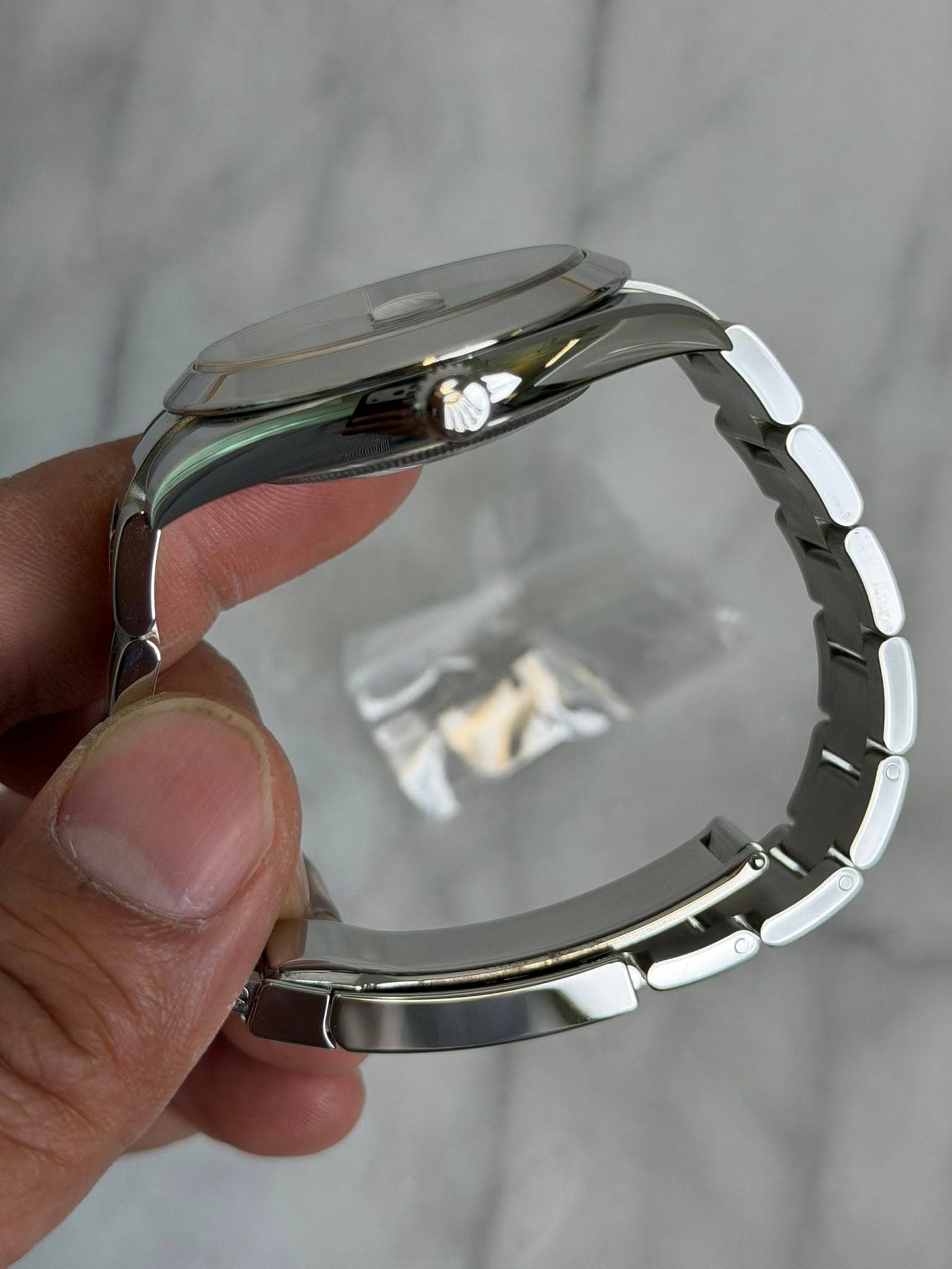 May be an image of wrist watch