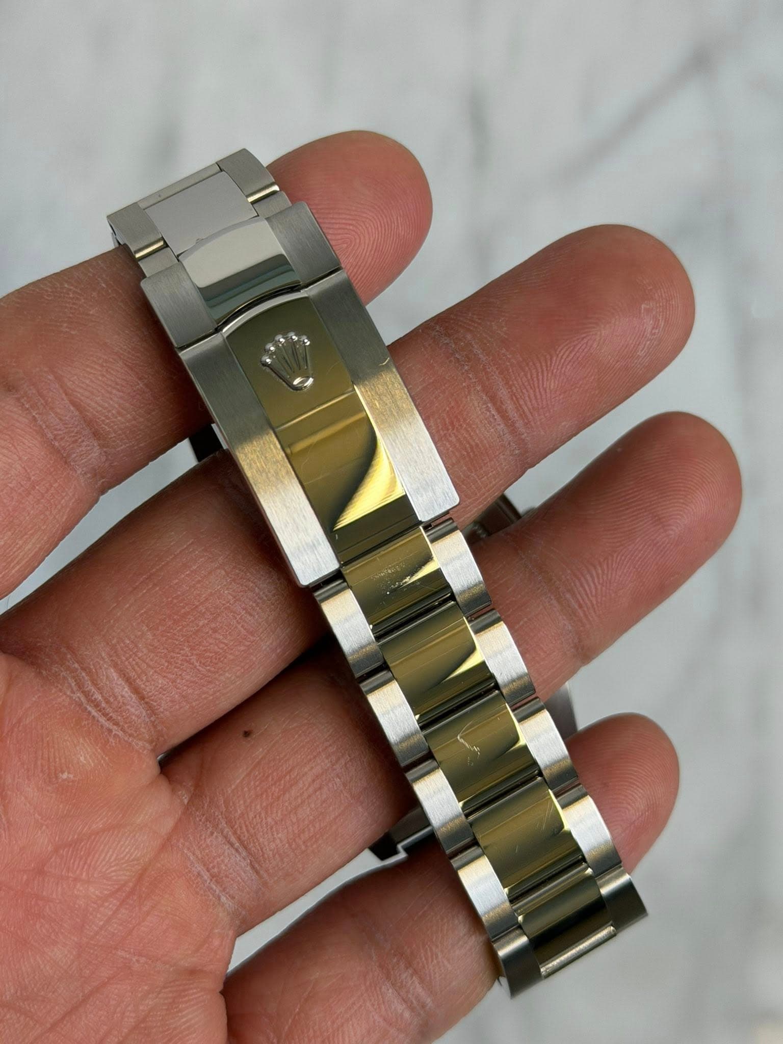 May be an image of wrist watch
