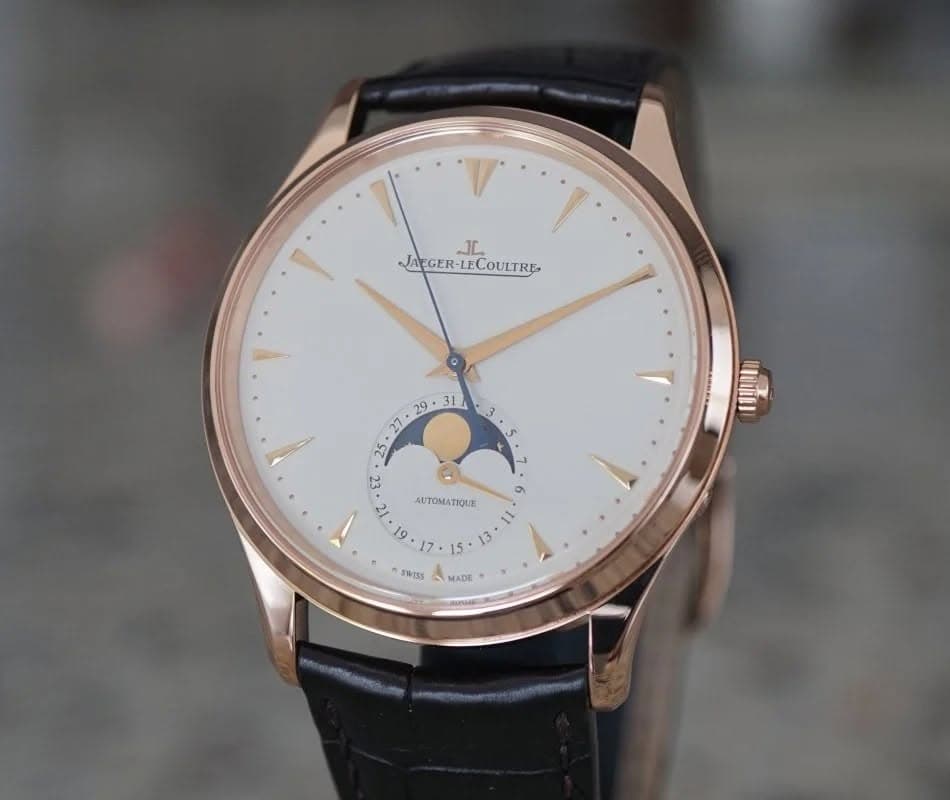 May be an image of wrist watch and text that says 'JL. JAEGER-LECOULTRE -LECOULTRE JAEGER 3t 2 21 19 UUITO 6 AUTOMATIQUE MOUE AUTOMATY 7.15 Y 1s w SWISS MADE'