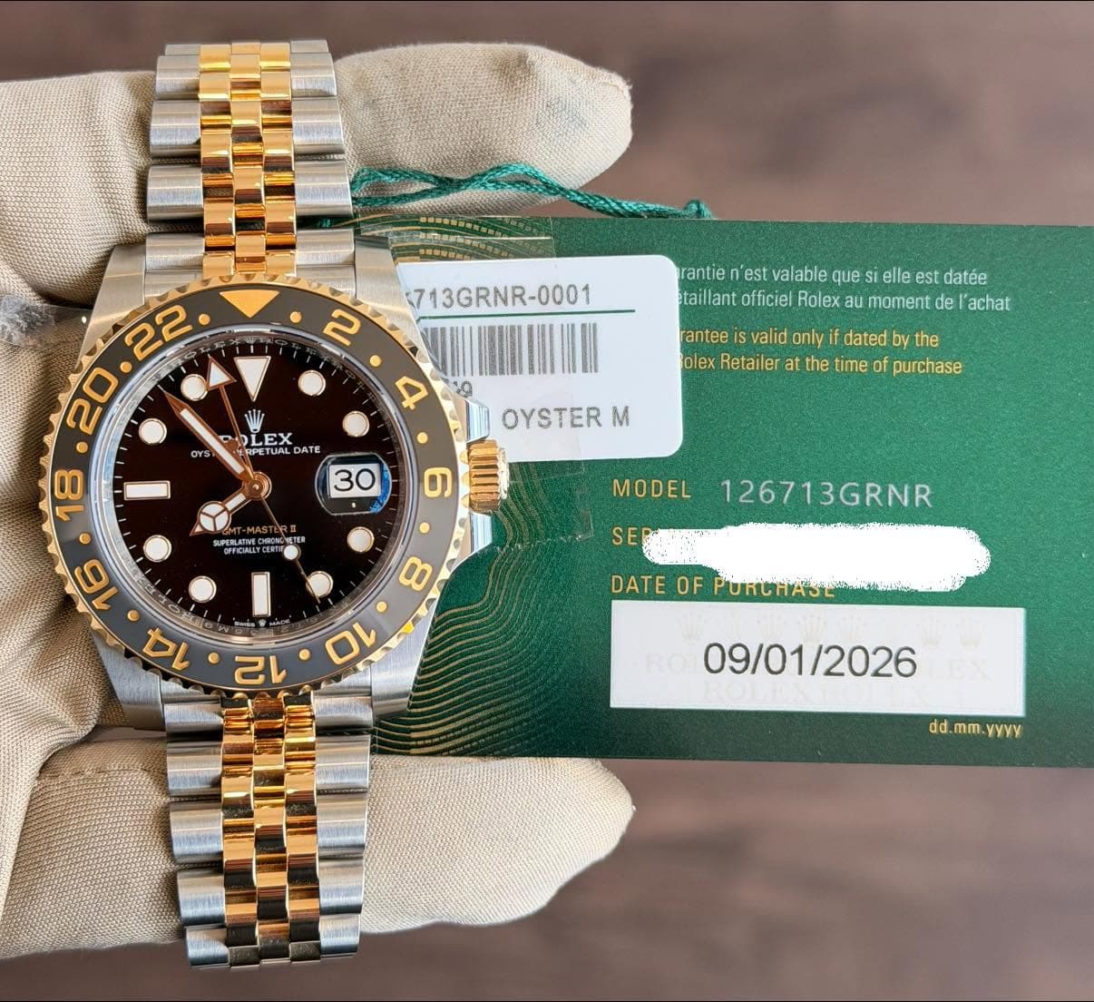 May be an image of wrist watch and text that says '713GRNR- rantie est alable que ell elle lee est sto datée etai llant officiel Rolex moment de 'achat rantee valid onlyi dated…
