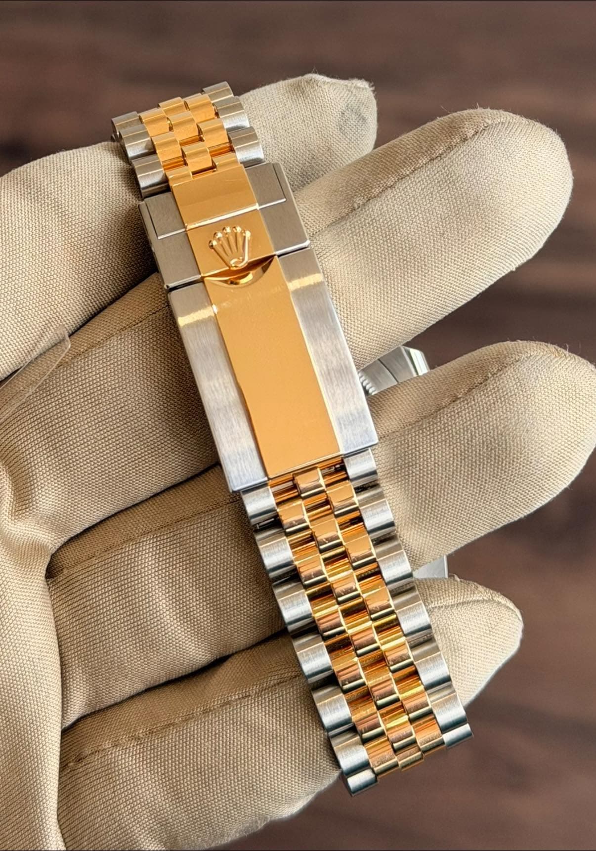 May be an image of jewelry and wrist watch