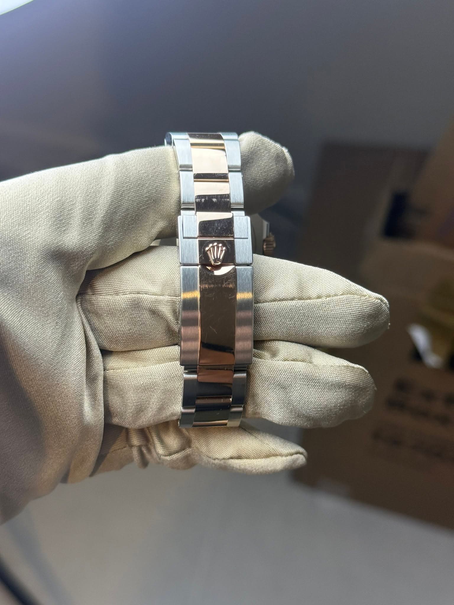 May be an image of wrist watch and text