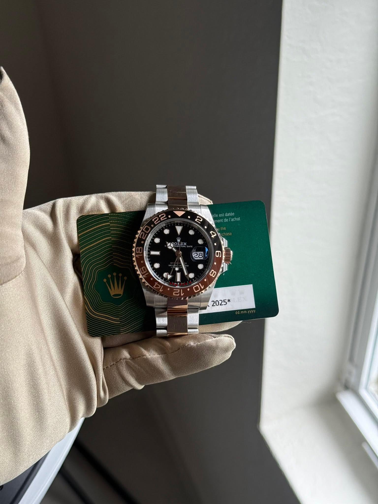 May be an image of wrist watch and text
