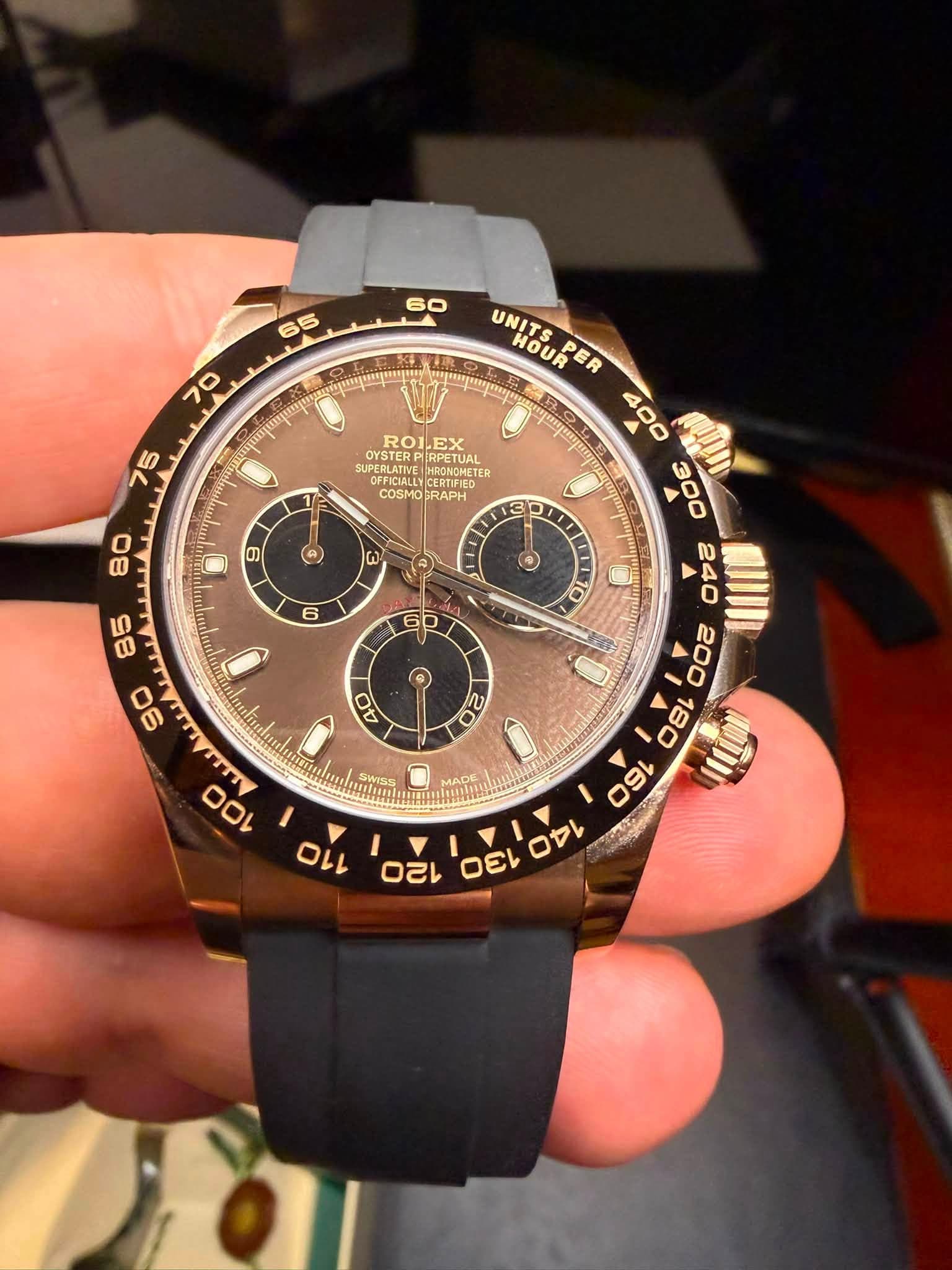 May be an image of wrist watch and text that says ' ROLEX OISTERP SUPERLATIVE OYSTERPIRPETU RPETUAL eppc 1 COSMO COSMOJRAPH RAPH 80 3 3 9 ) G HOUR UNITS.PER HOUPE ទតួនតរួបមមរង 400…