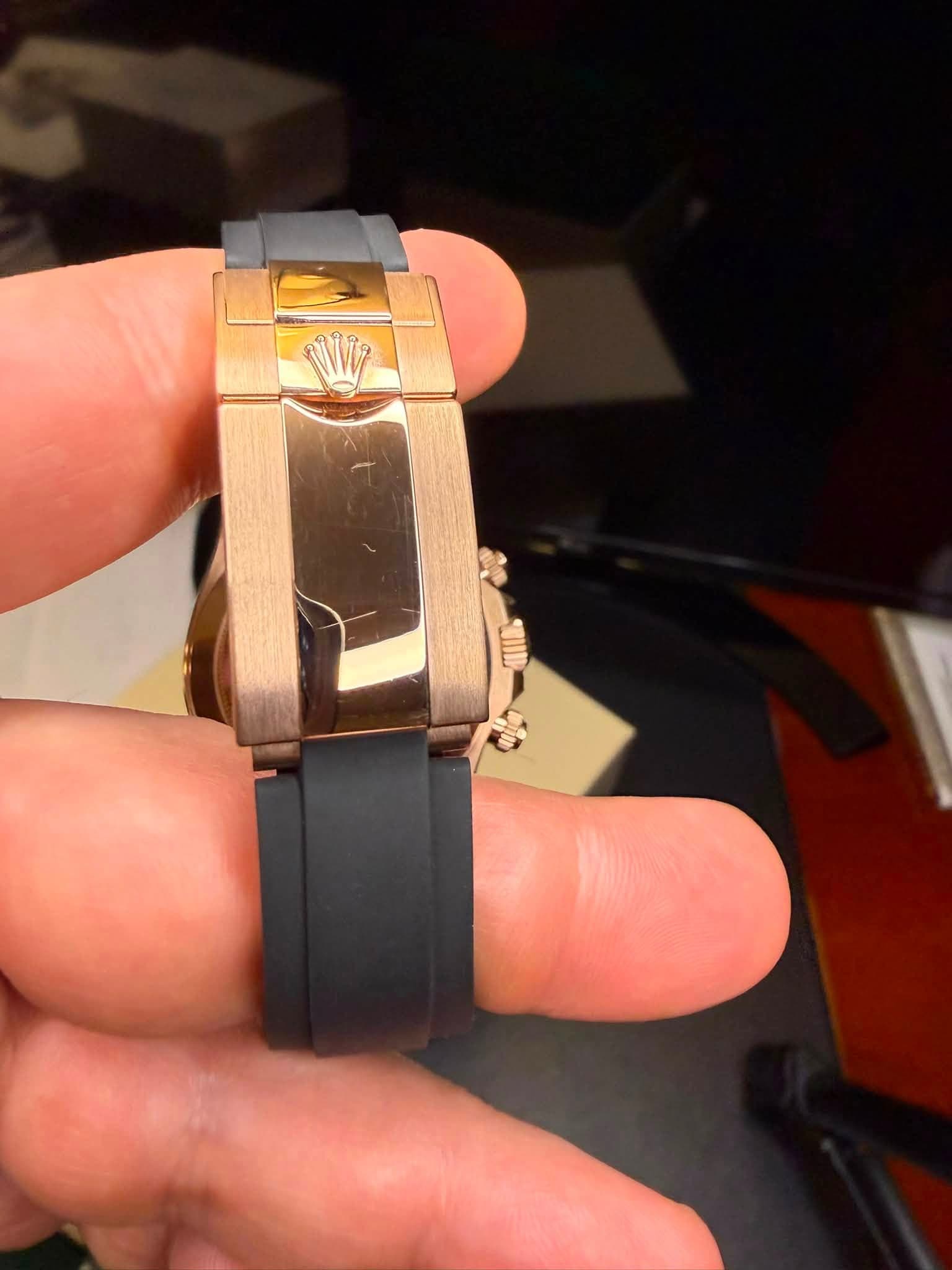May be an image of wrist watch and text that says 'G'