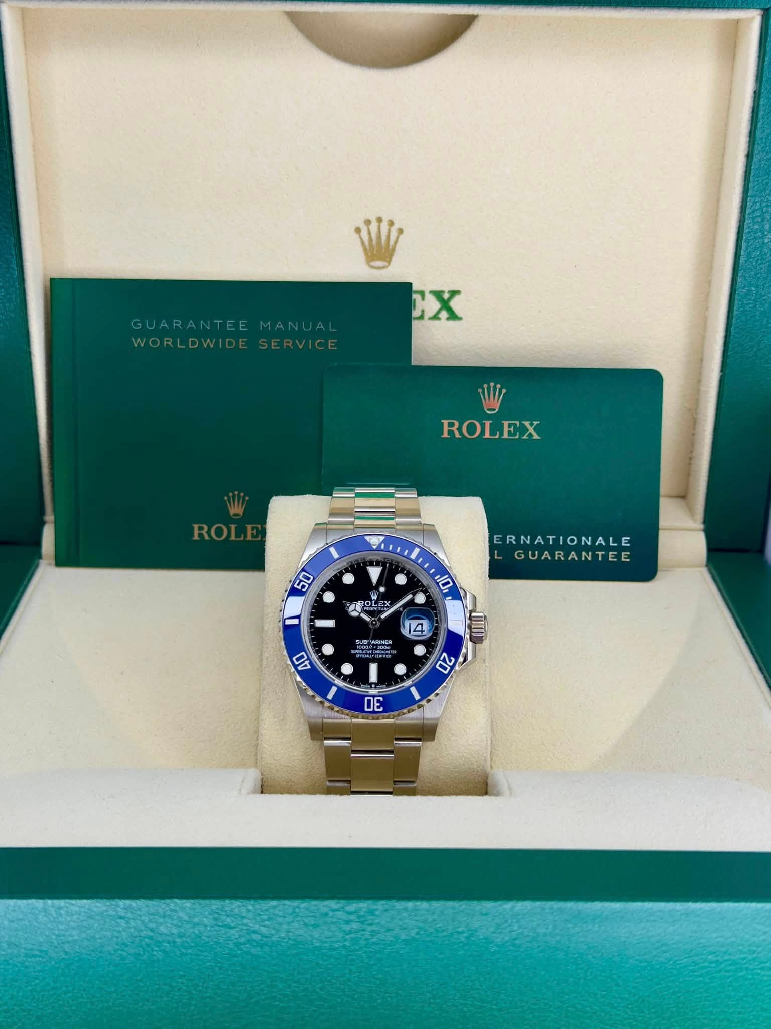May be an image of wrist watch and text that says 'GUARANTEE ANTEE MANUAL WORLDWIDE X ROLEX 50 IL ERNATIONALE GUARANTEE 10 وزل 14 AWN o4m EAG III 40 20 30'