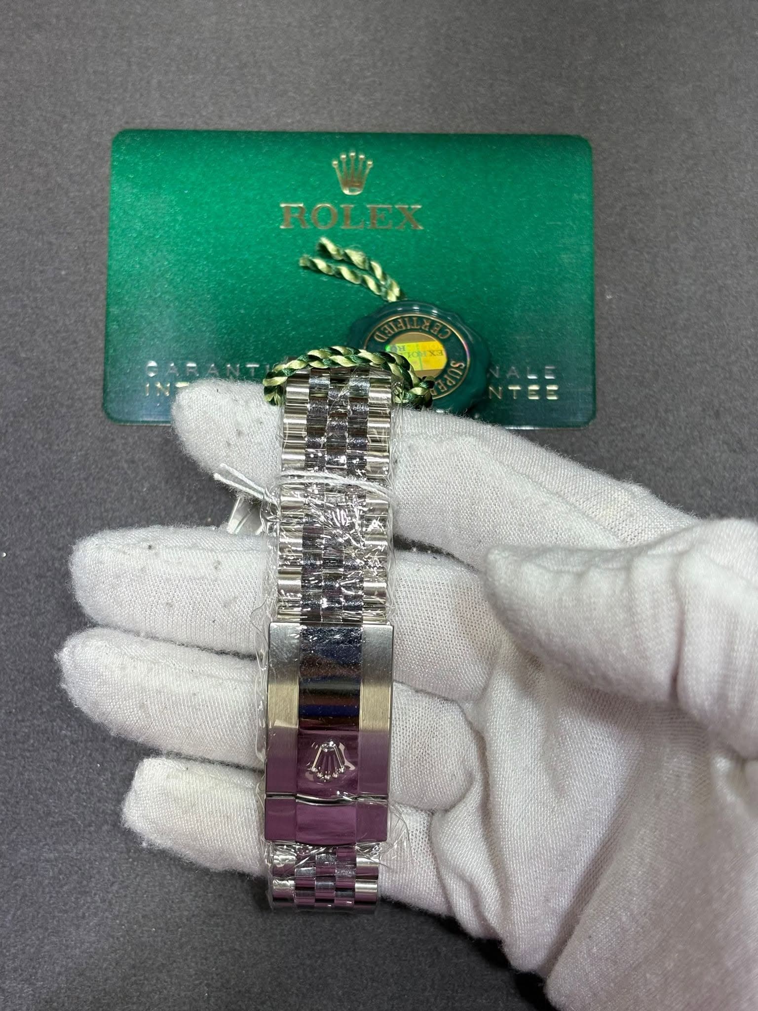 May be an image of wrist watch and text that says 'ROLEX'