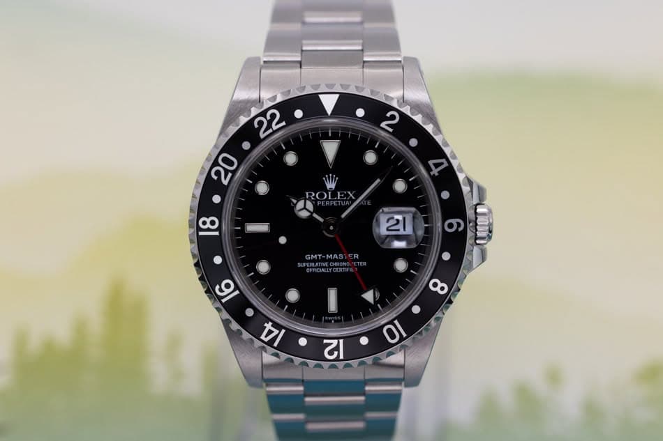 May be an image of wrist watch and text