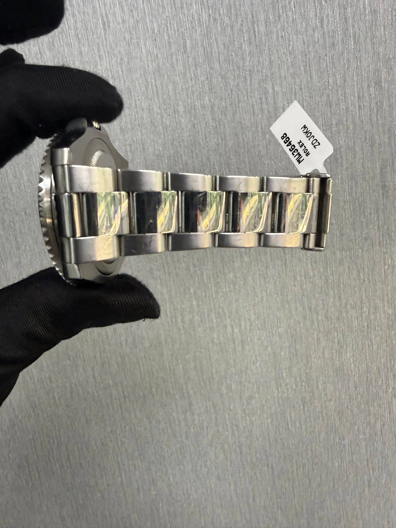 May be an image of wrist watch and text