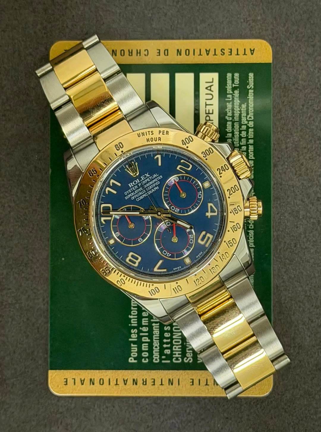 May be an image of wrist watch and text that says 'UNITS PER HOUR 60 10 ម 3α TATTATTIITO présante Suisse d'achat inappropnee. lagarantie. Chronométre data 400 EMPETUAL titre 300…