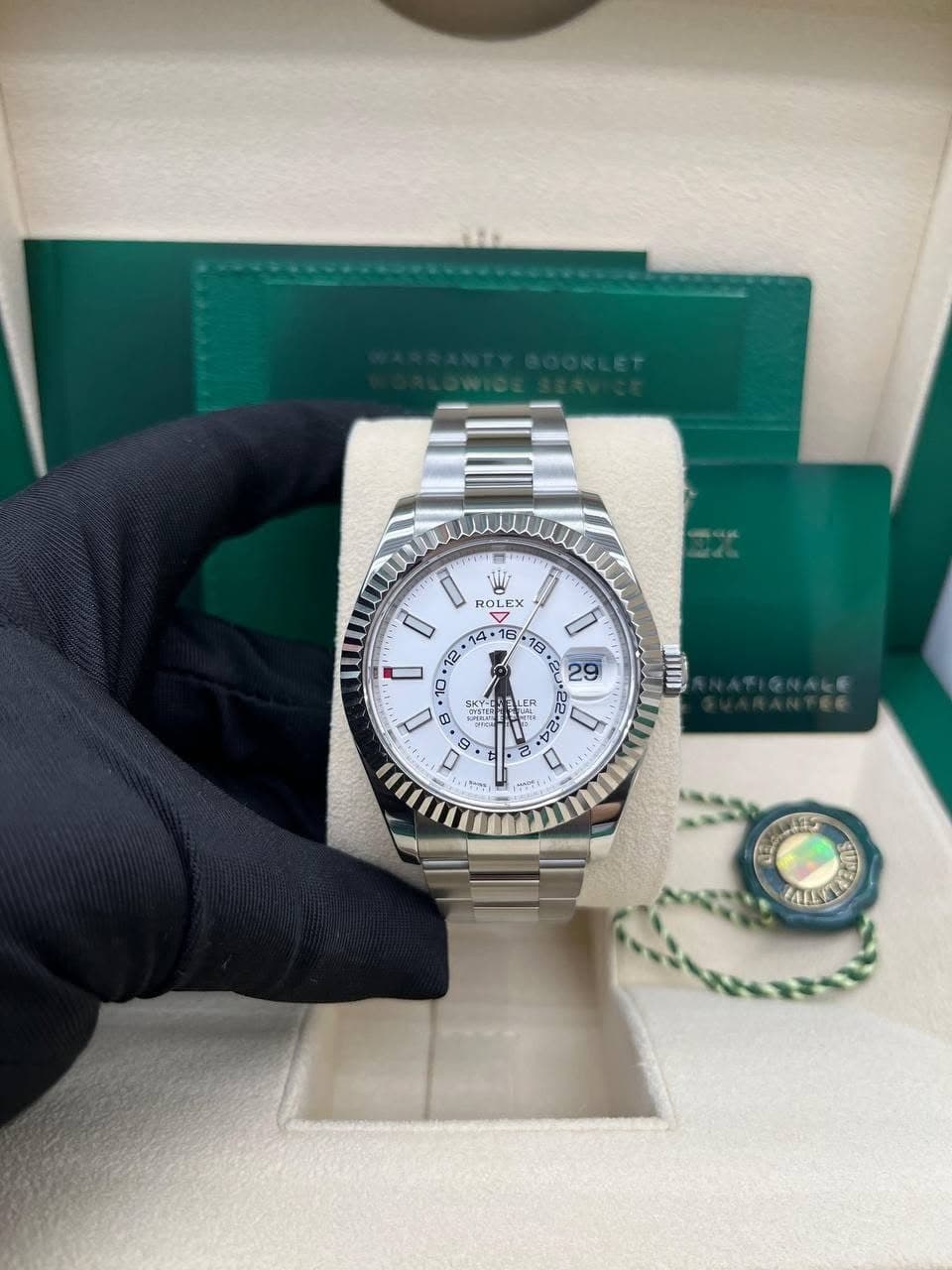 May be an image of wrist watch and text