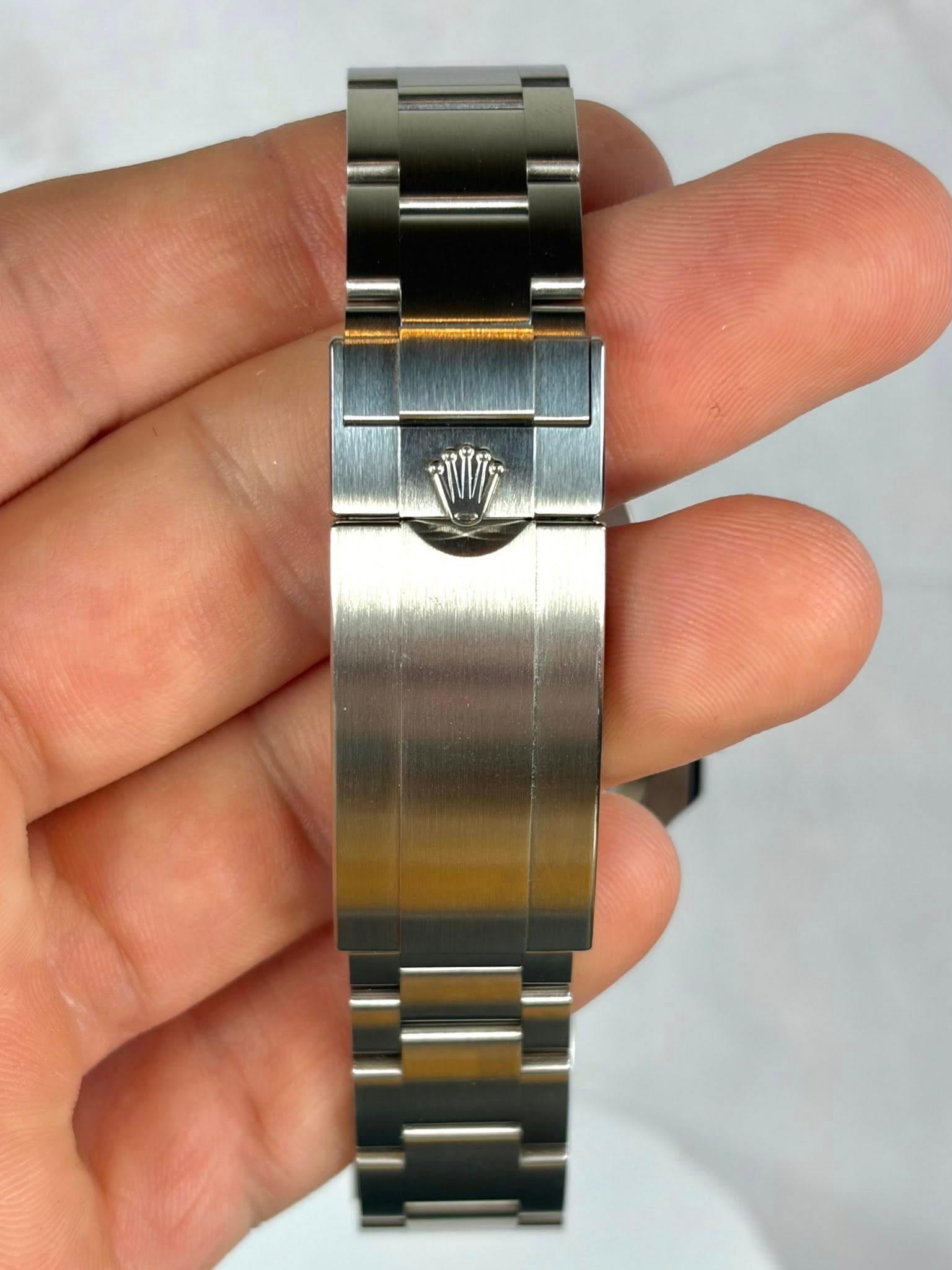 May be an image of wrist watch