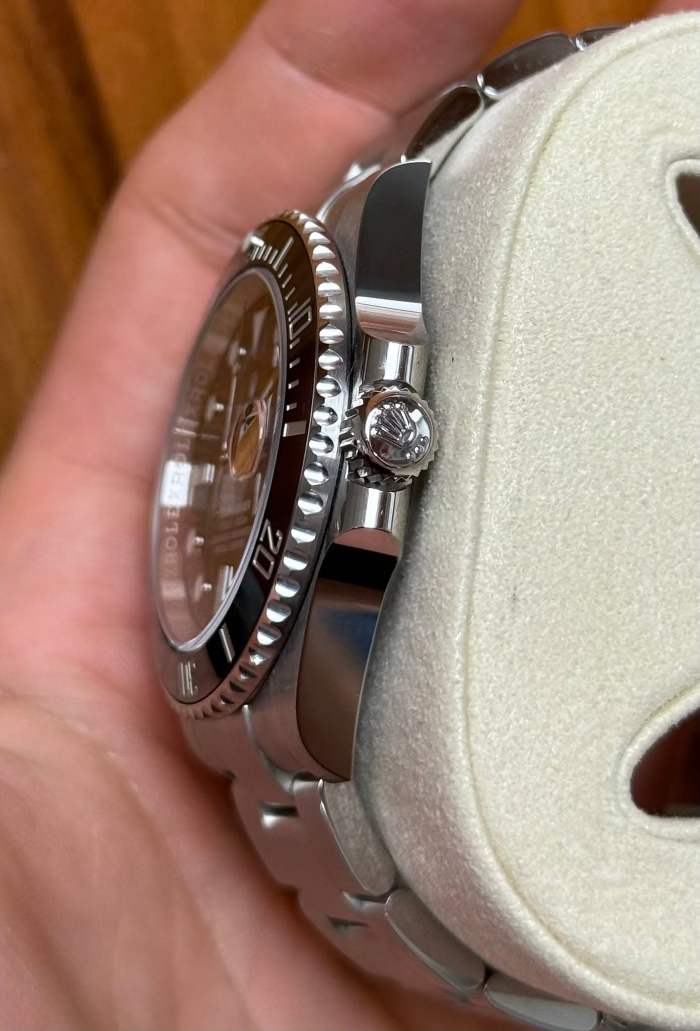 May be an image of wrist watch and text