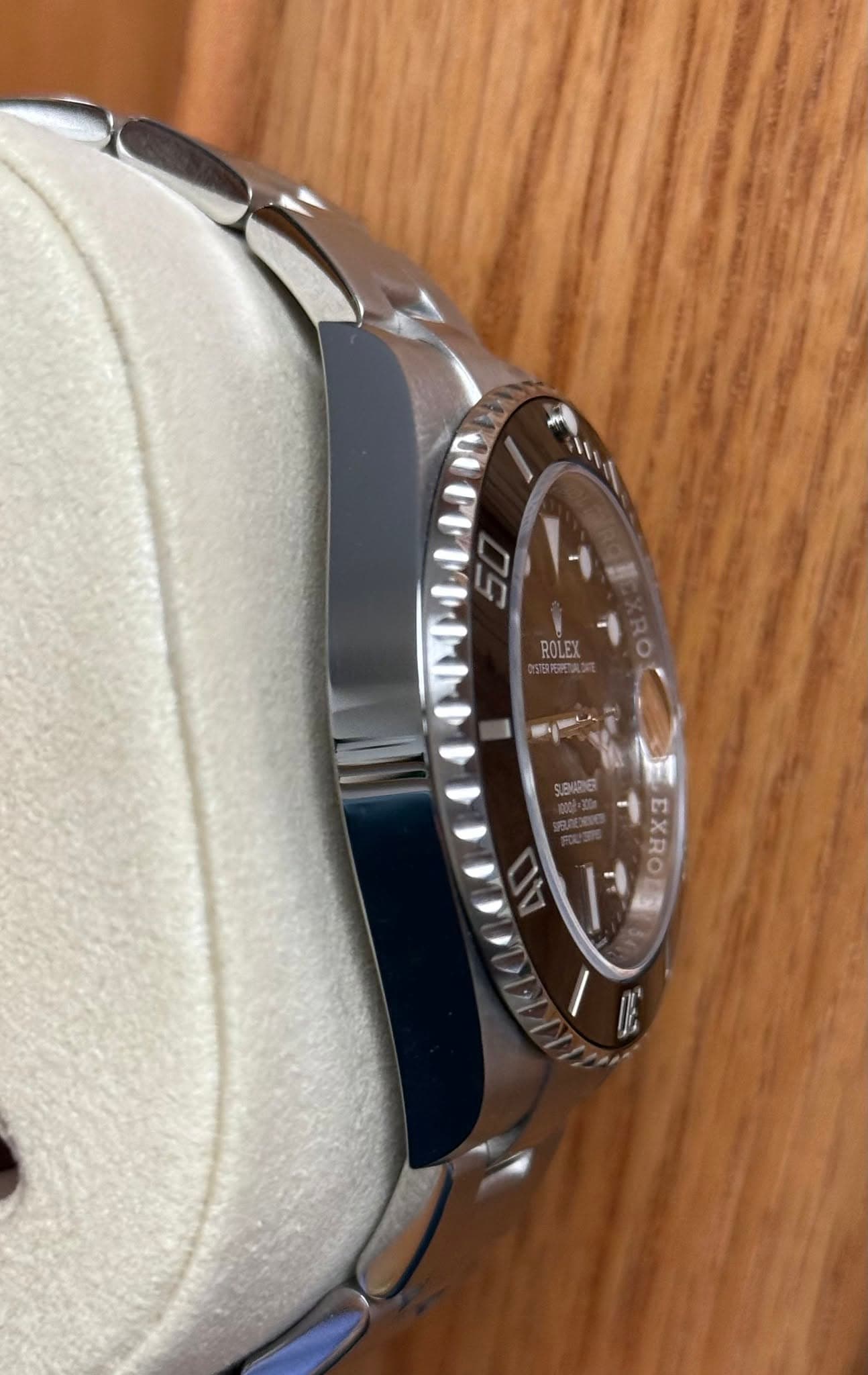 May be an image of wrist watch and text