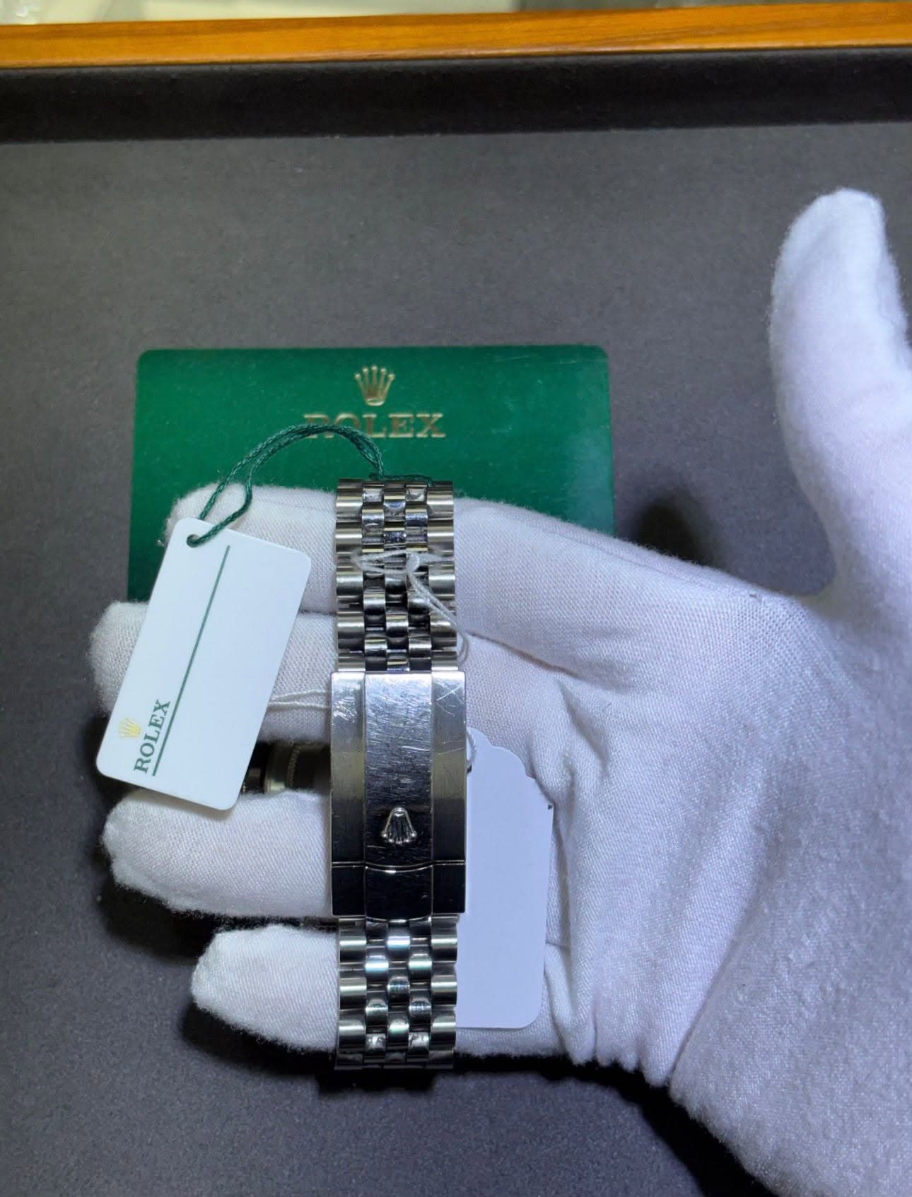May be an image of wrist watch and text that says 'ROLEX'