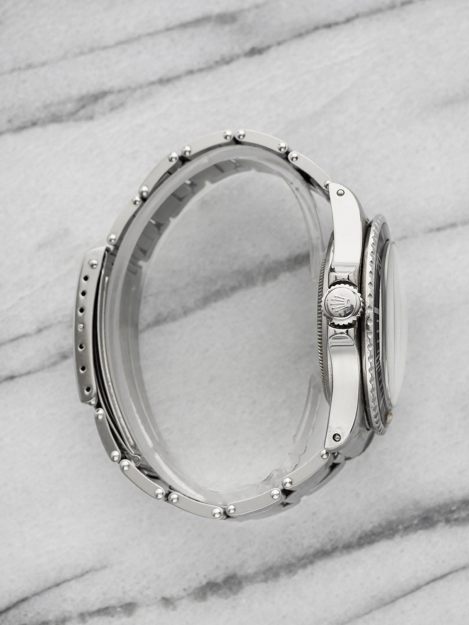 May be an image of jewelry and wrist watch