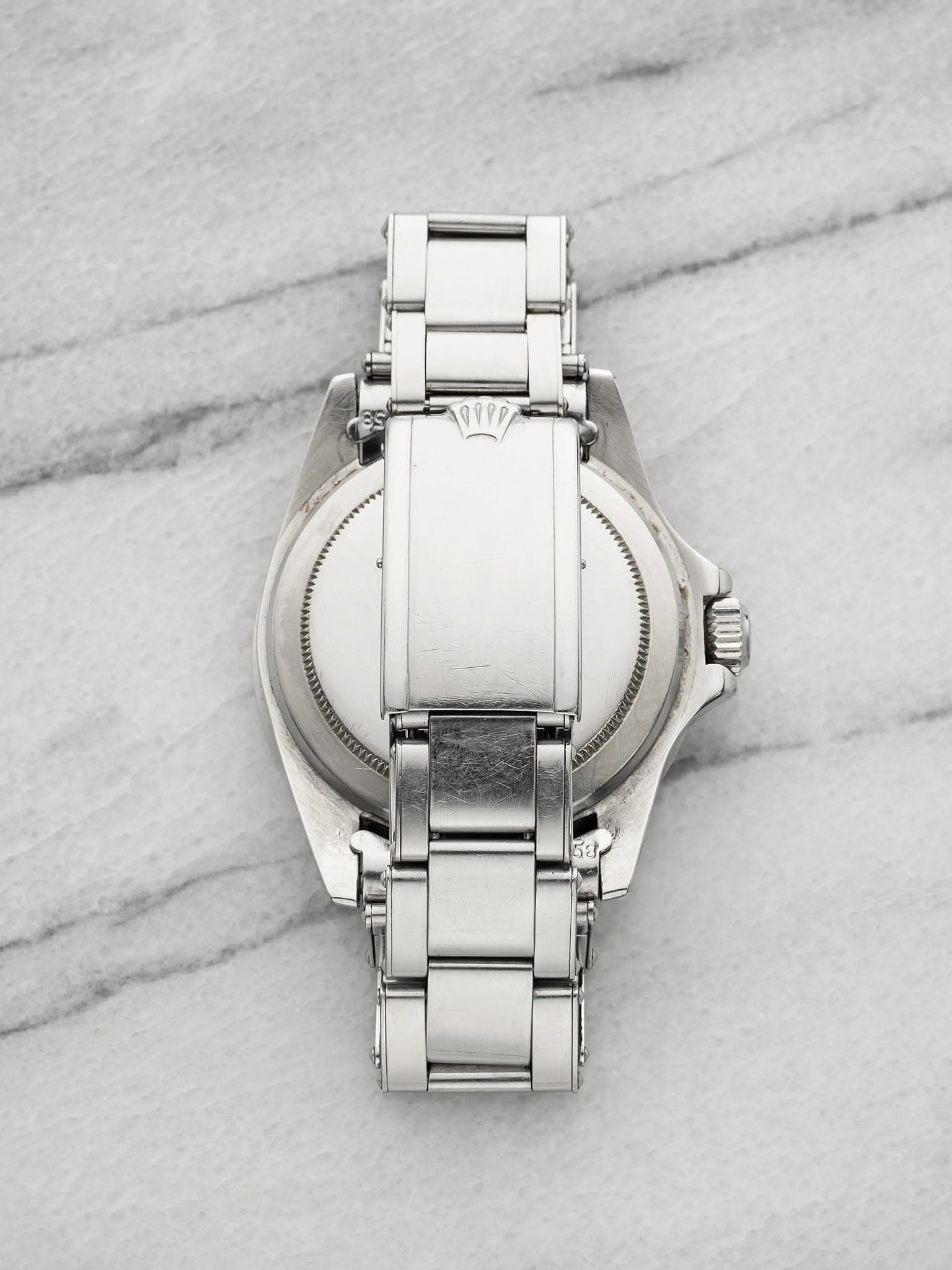 May be an image of wrist watch