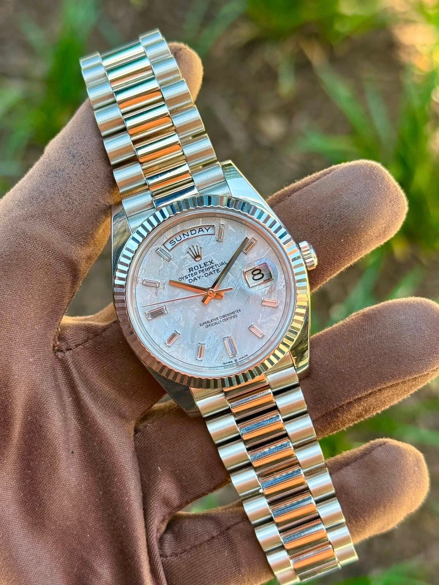 May be an image of wrist watch and text