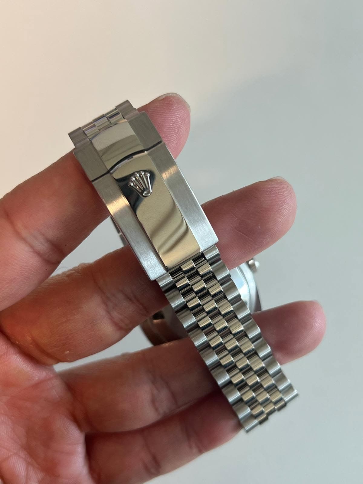 May be an image of wrist watch