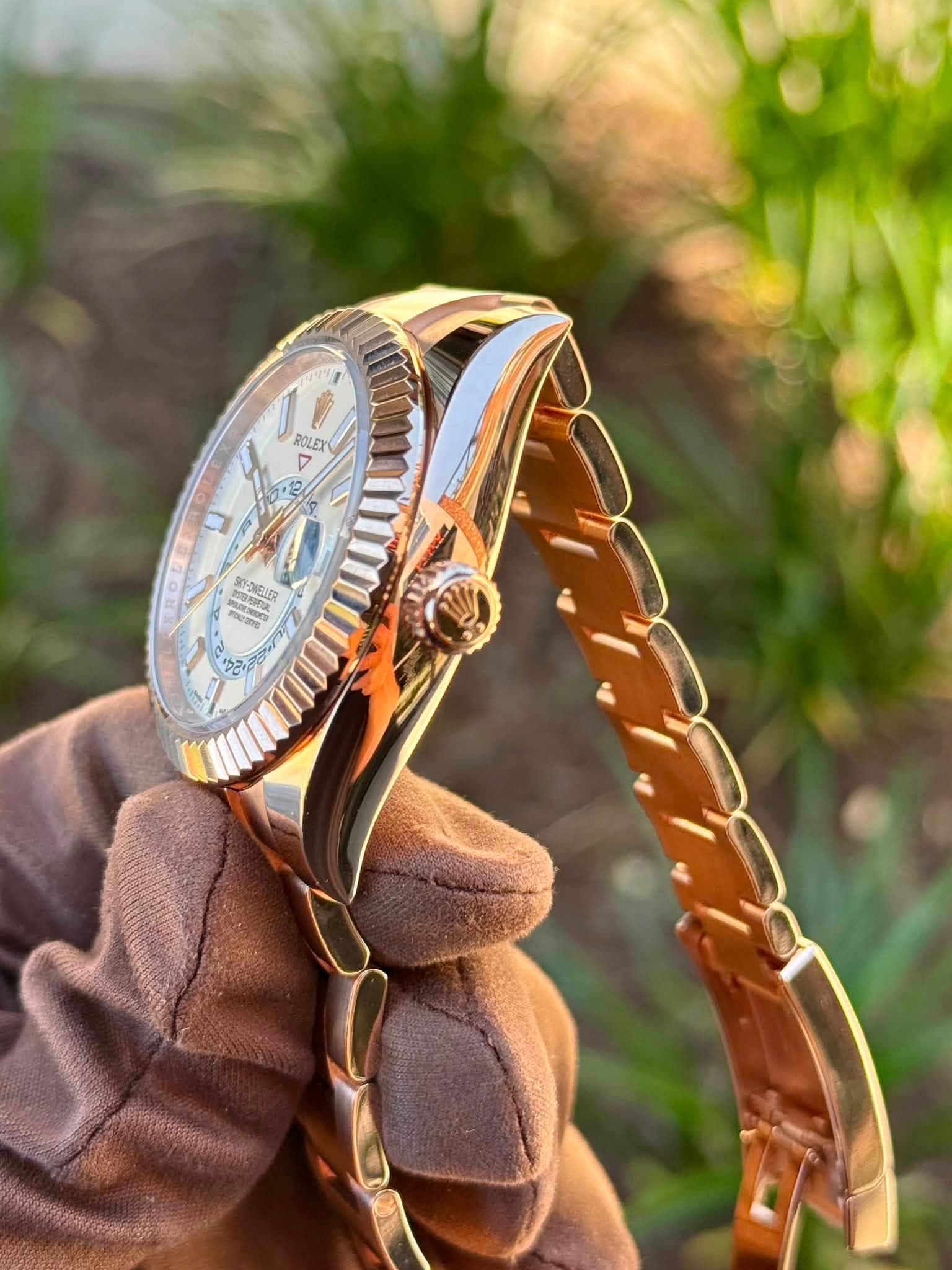 May be an image of jewelry, wrist watch and text