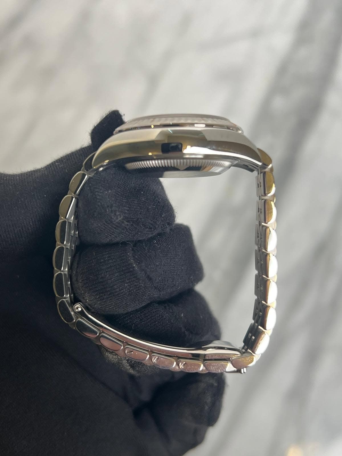 May be an image of wrist watch