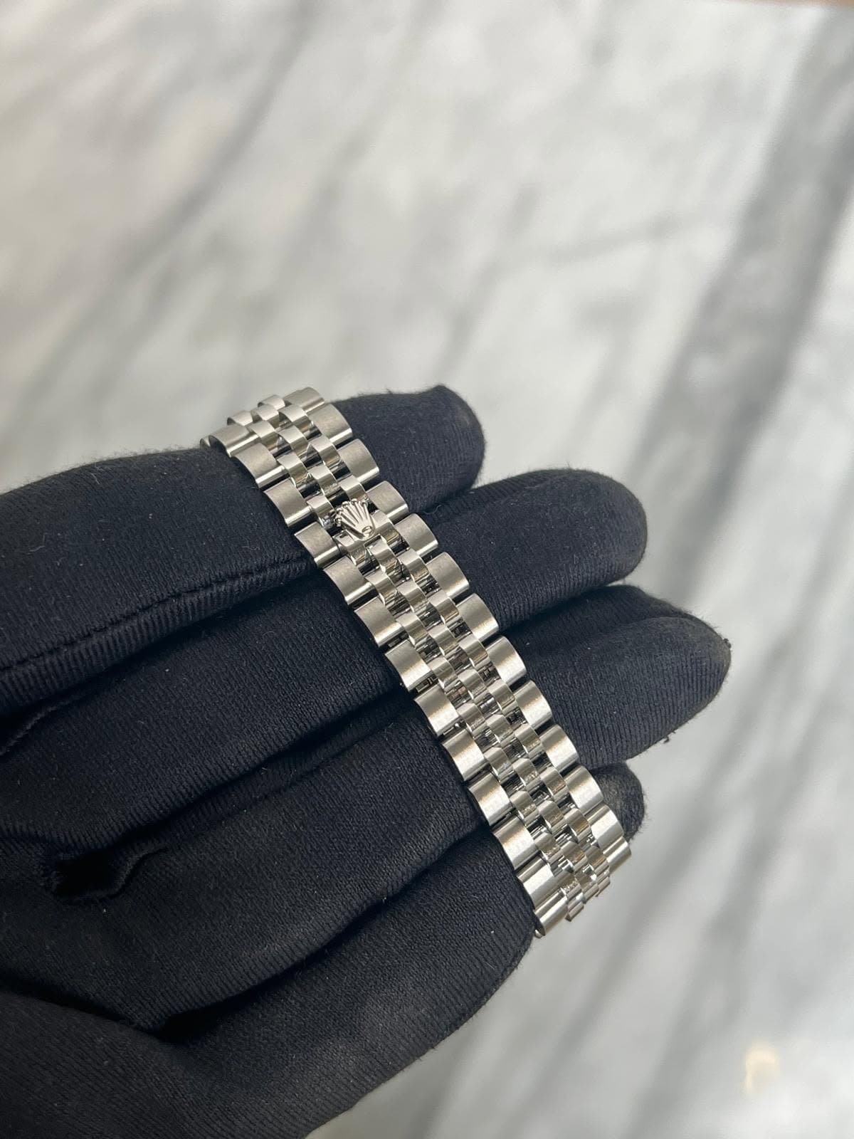 May be an image of wrist watch
