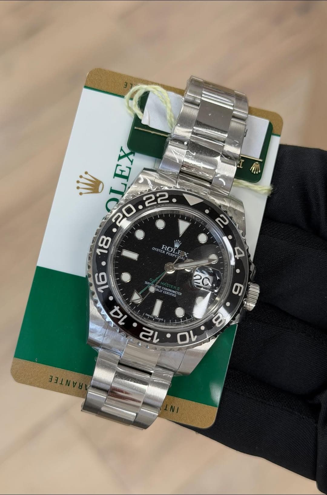 May be an image of wrist watch and text