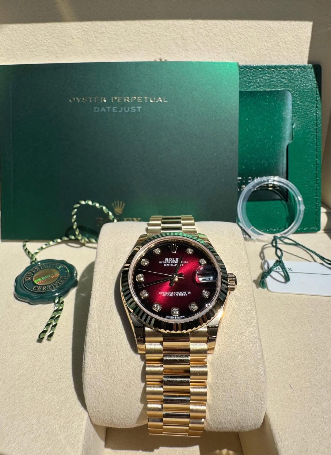 May be an image of wrist watch and text