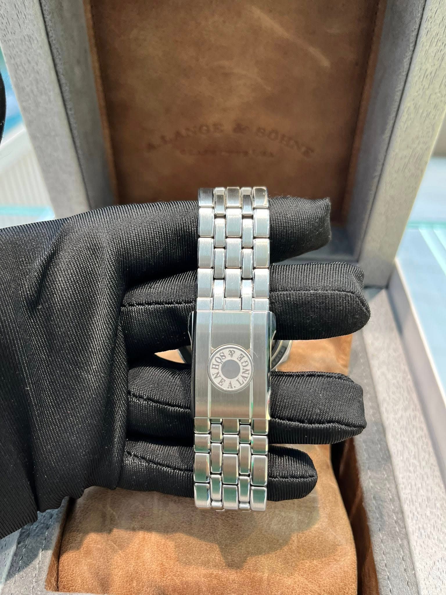 May be an image of wrist watch and text