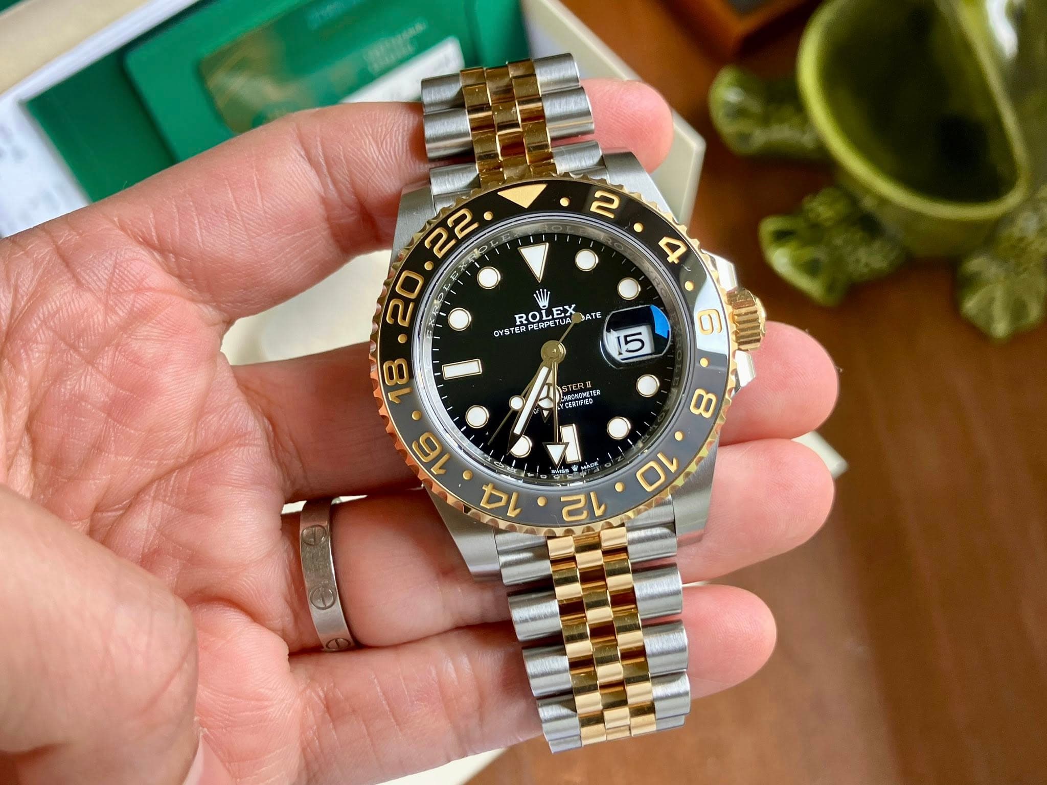 May be an image of wrist watch and text