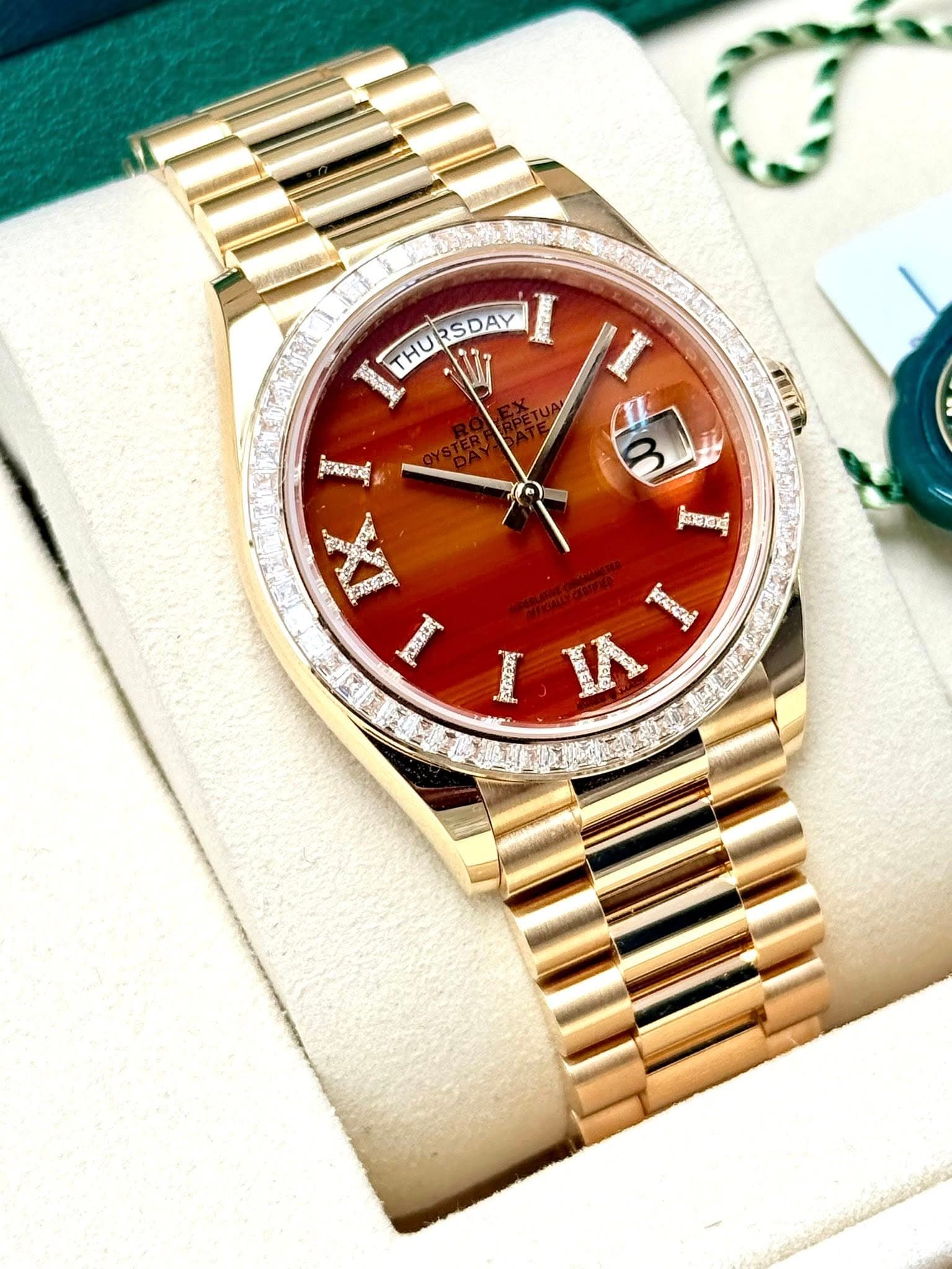 May be an image of wrist watch and text