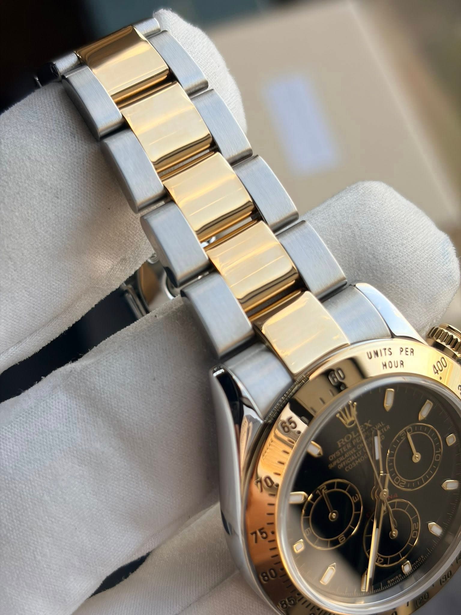 May be an image of wrist watch and text