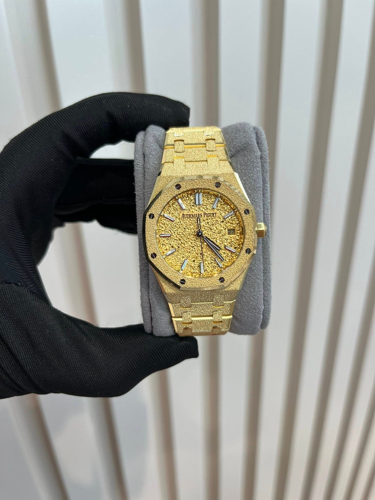 May be an image of wrist watch and text