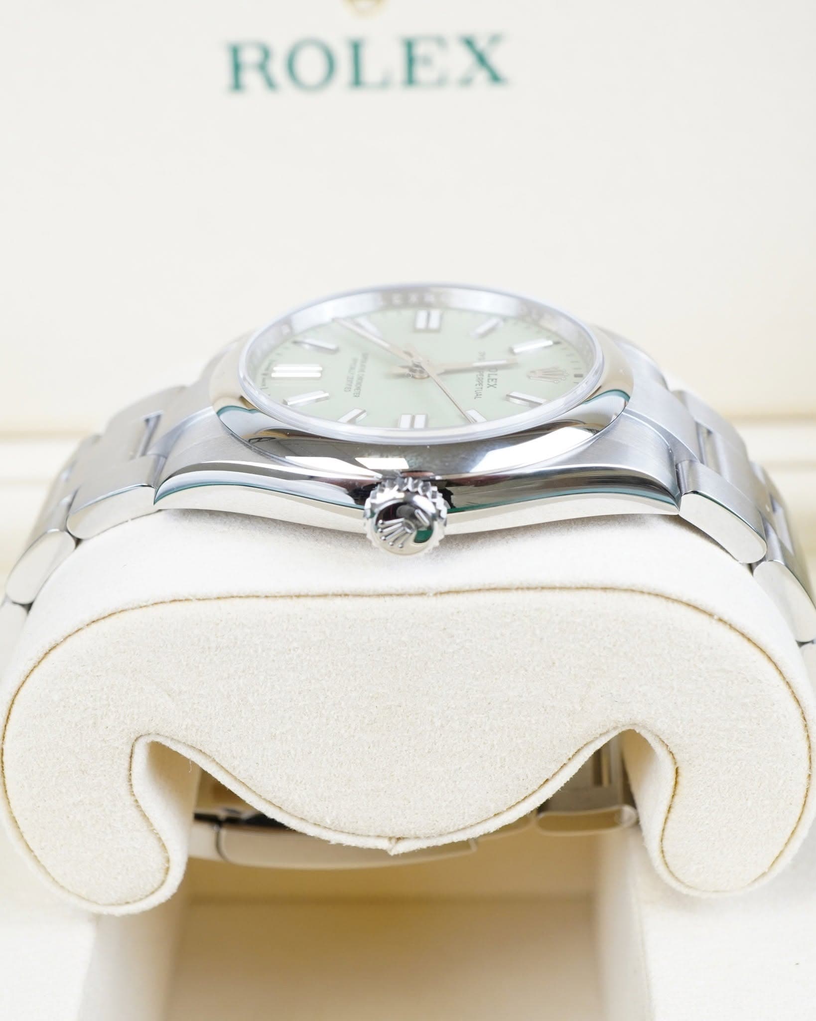 May be an image of wrist watch and text that says 'ROLEX EX ROL ឡ្ា Ua LEX'
