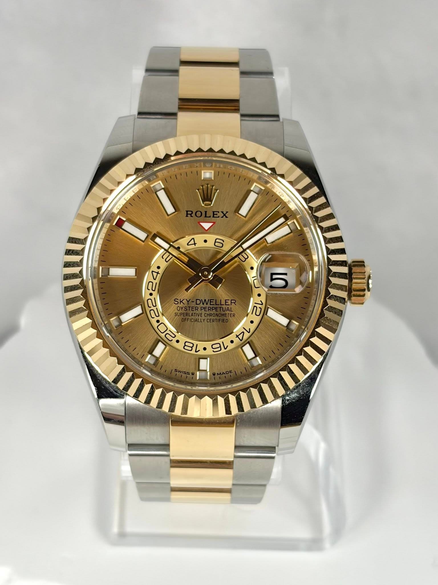 May be an image of wrist watch and text