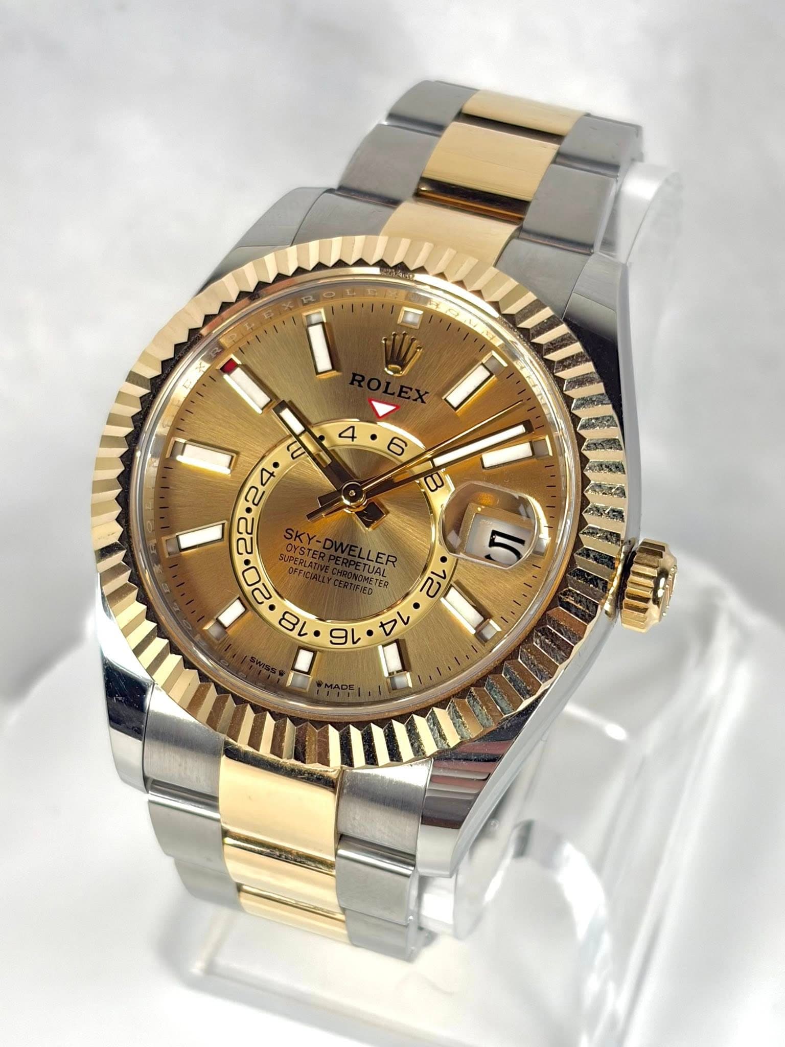 May be an image of wrist watch and text