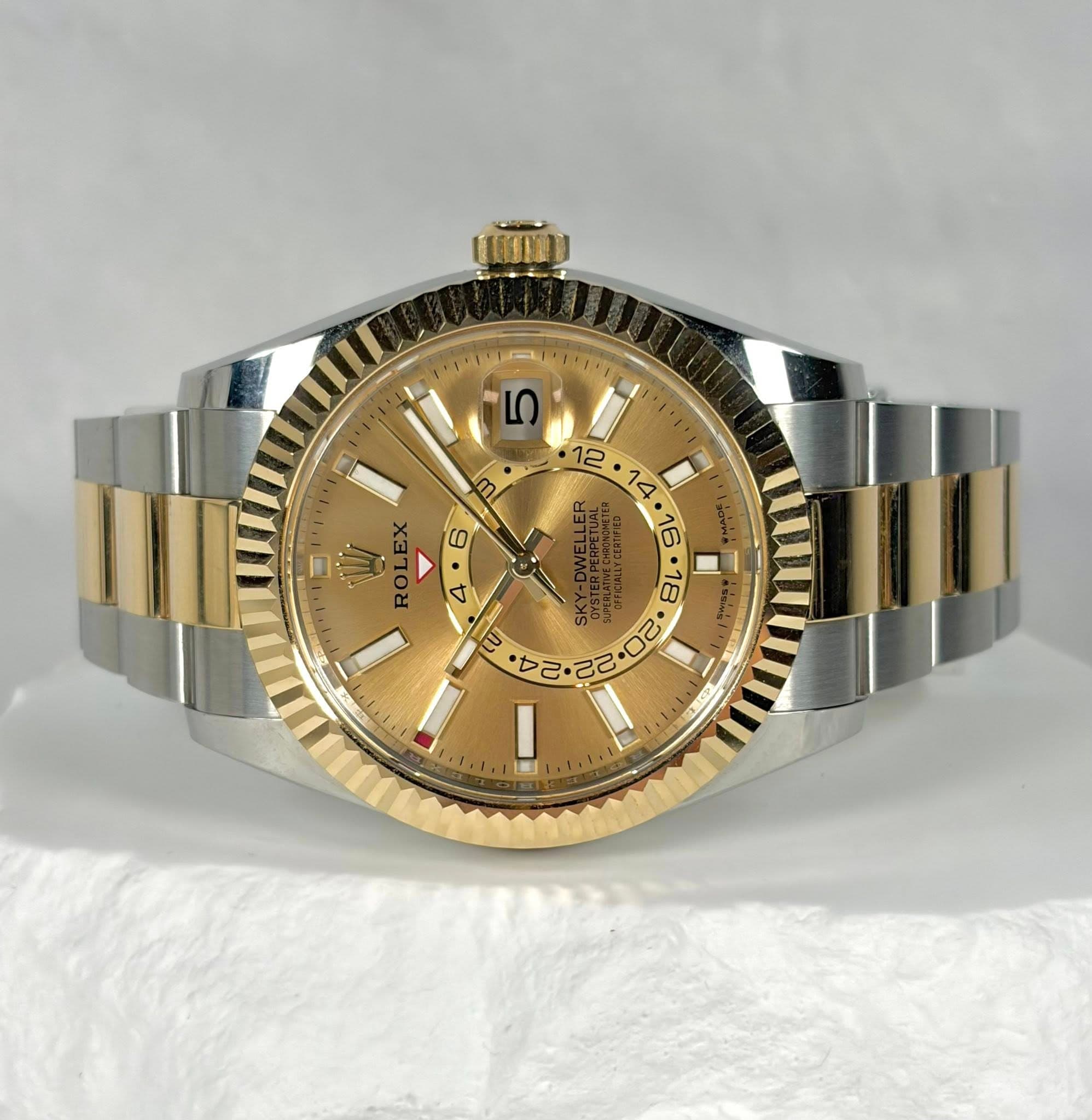 May be an image of wrist watch and text