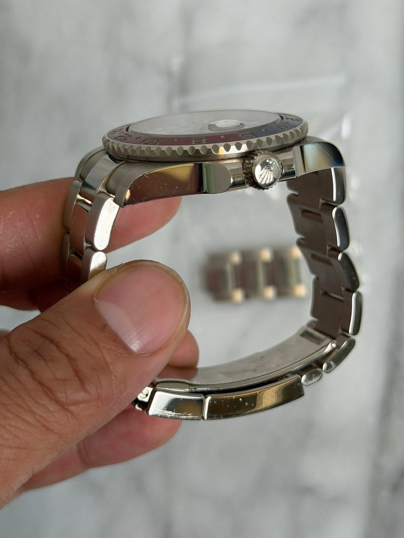 May be an image of wrist watch