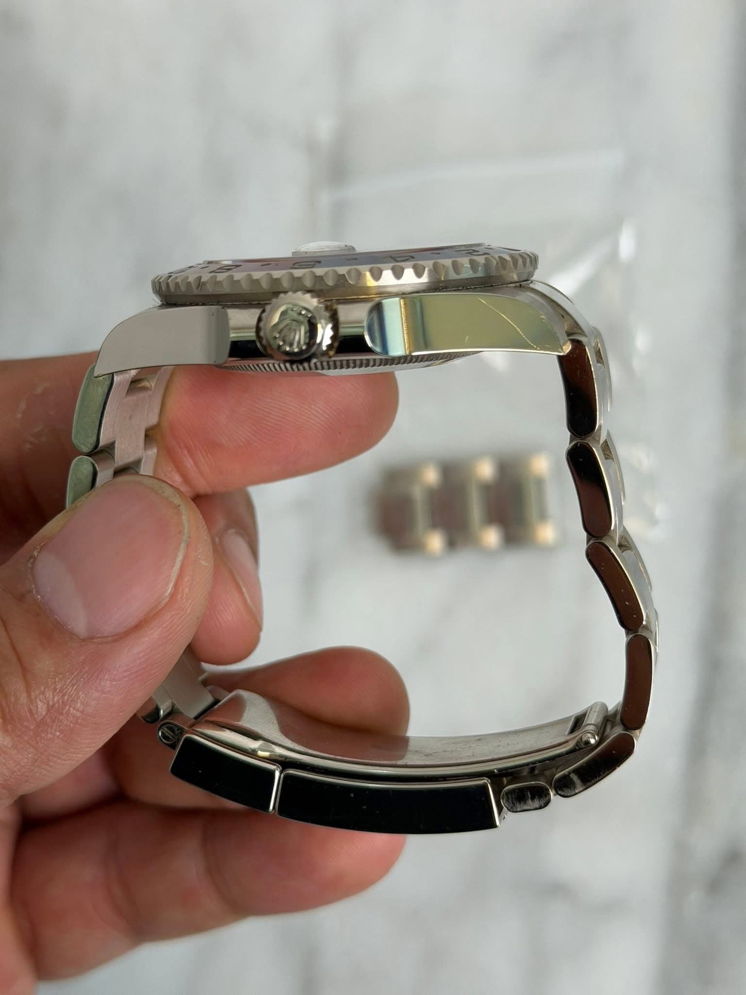 May be an image of wrist watch