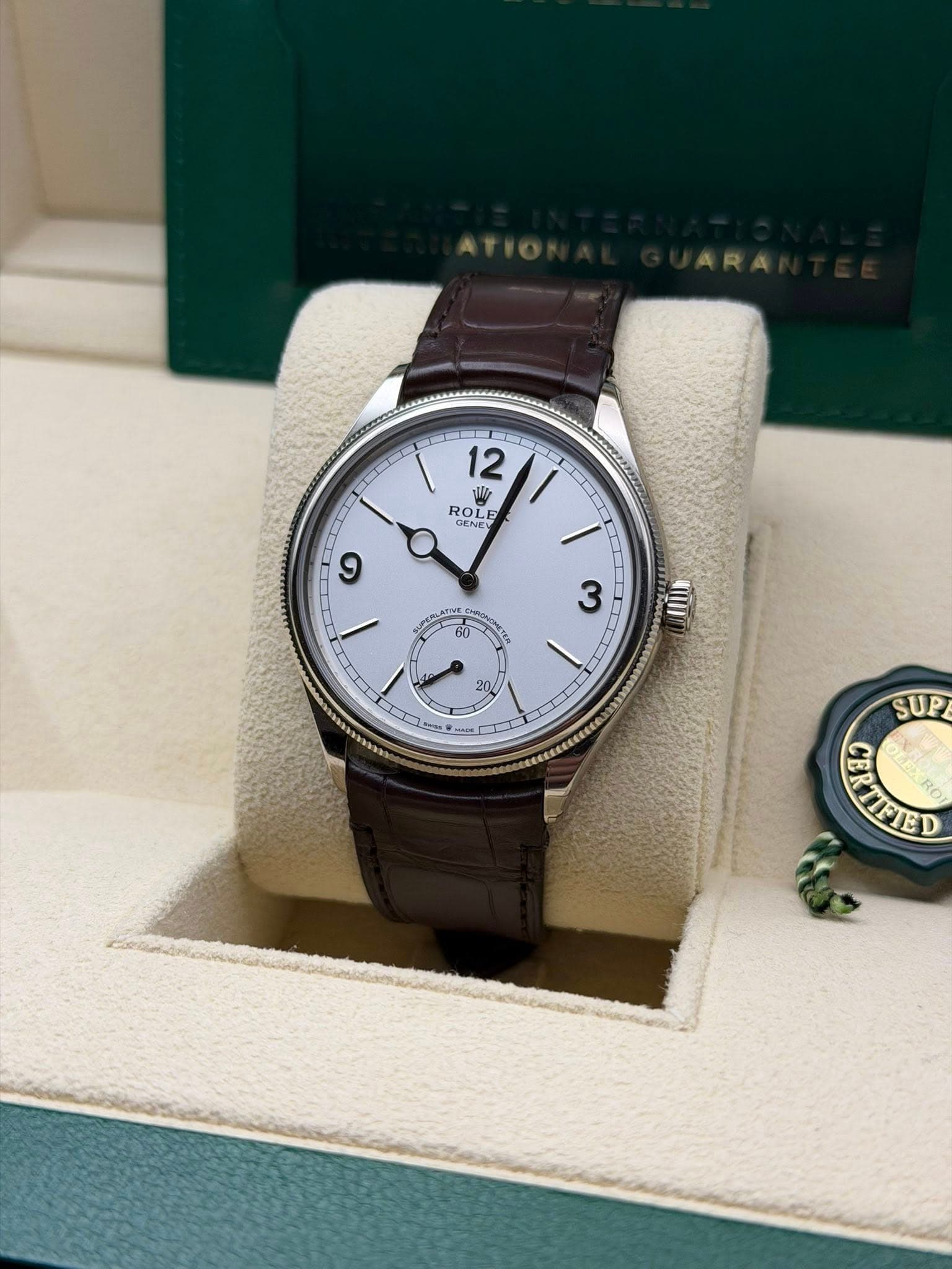 May be an image of wrist watch and text