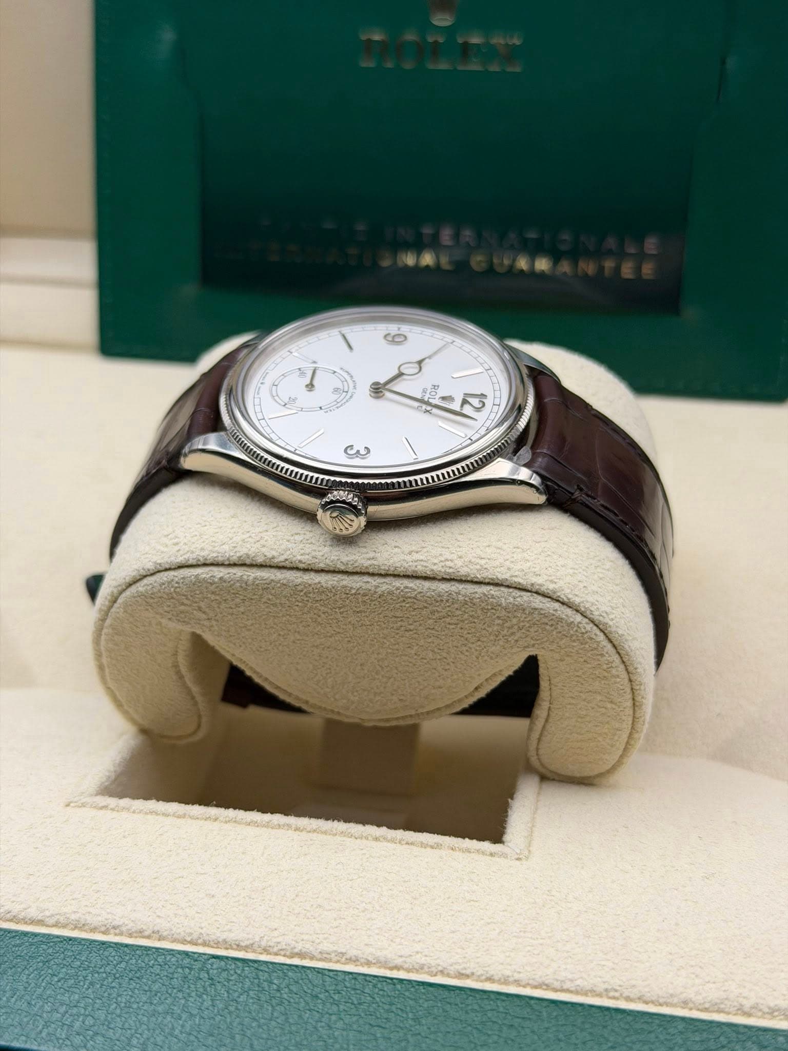 May be an image of wrist watch and text