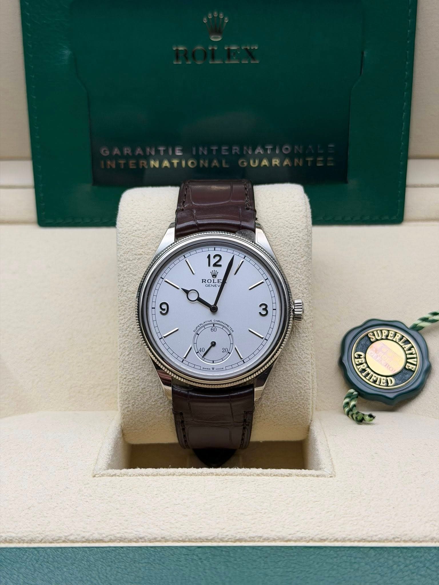 May be an image of wrist watch and text that says 'NATIO NATIO UAR 12 ROLE ROLE GENEV و 3 คก -- ዝበማ UAMA SUP SUPERL'