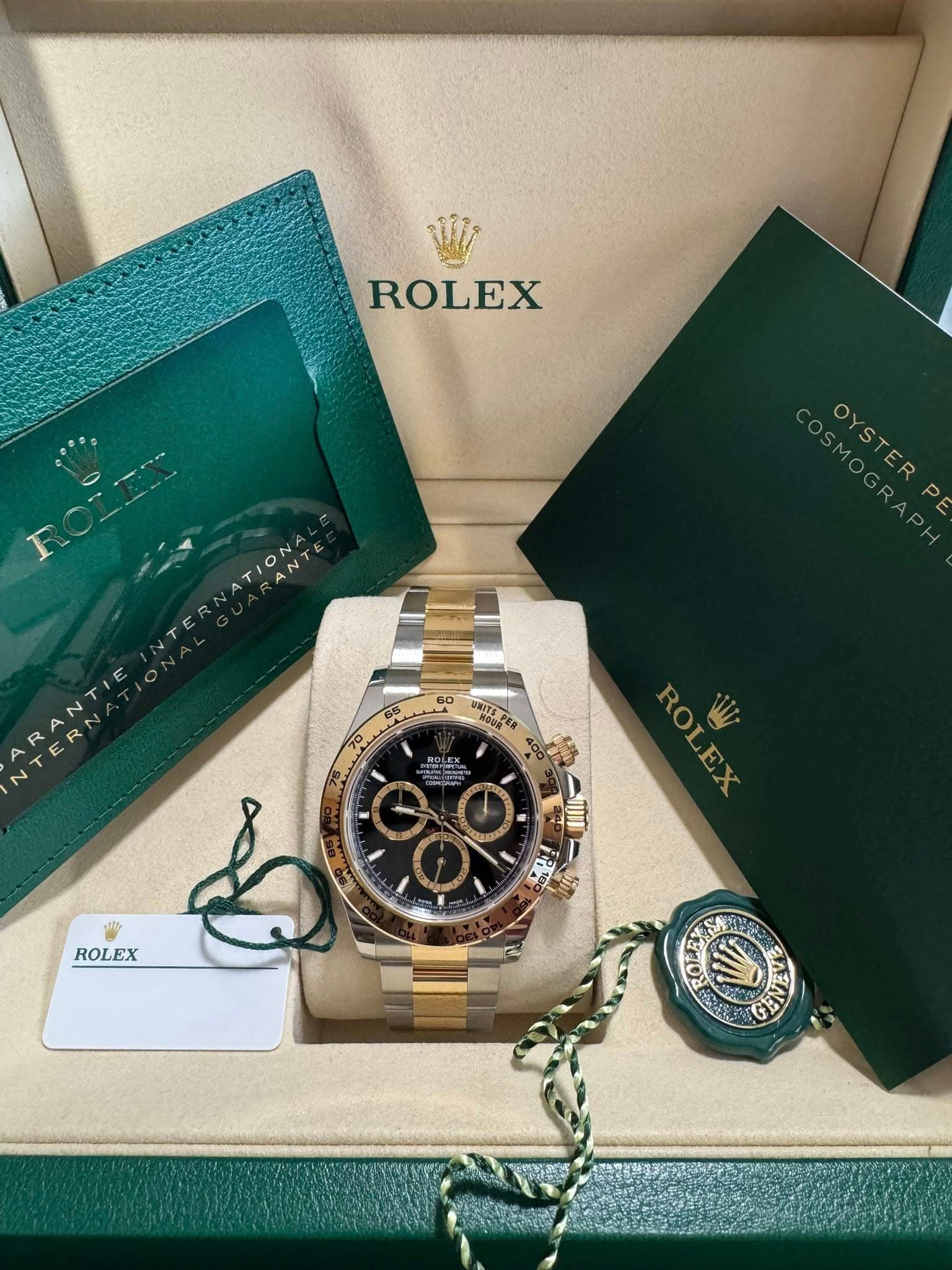 May be an image of wrist watch and text