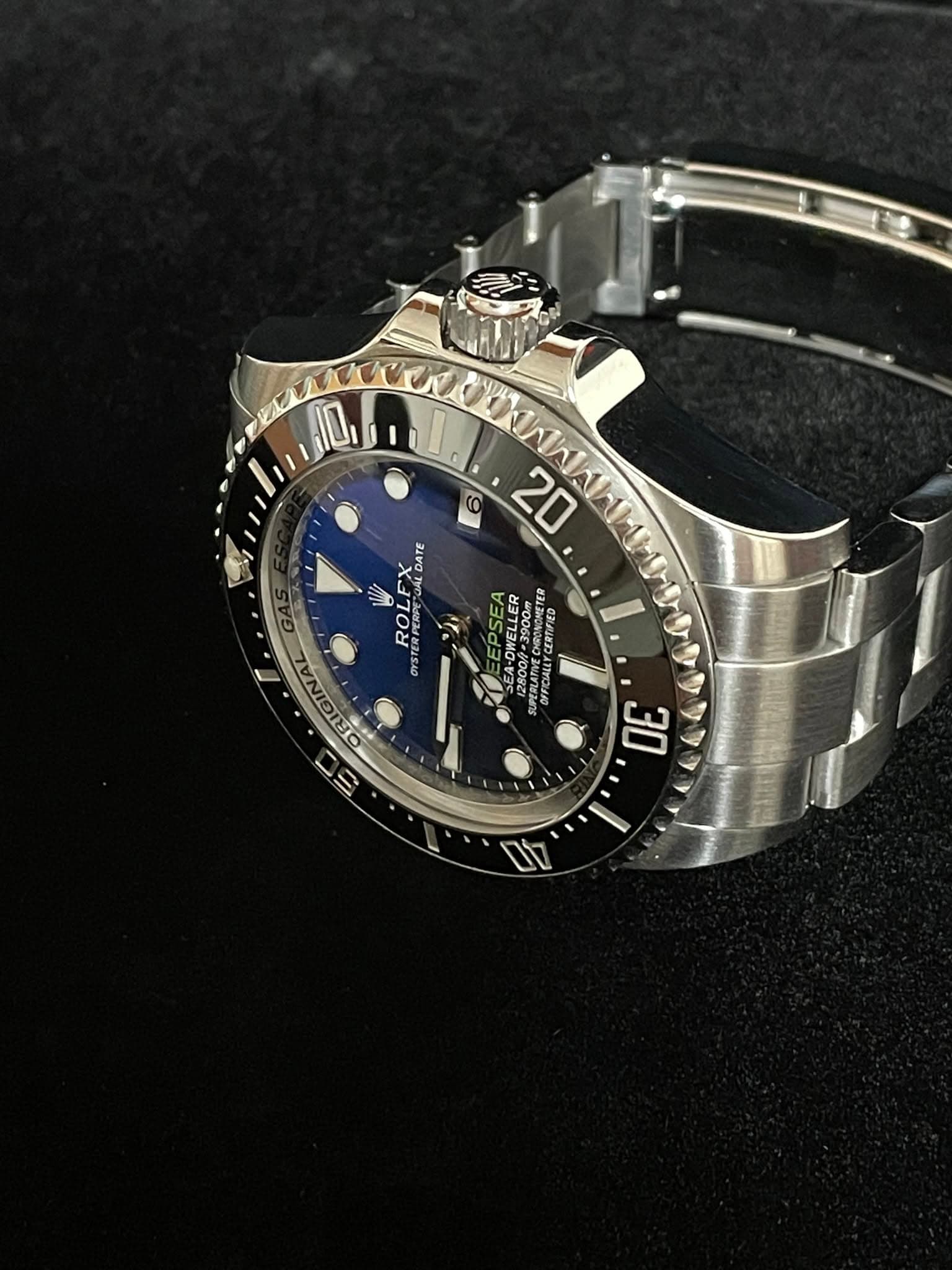 May be an image of wrist watch and text