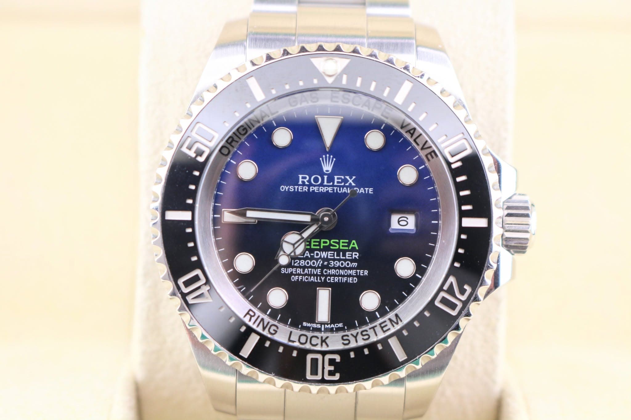 May be an image of wrist watch and text that says '50 i GAS ESCAP VALVE E 10 ROLEX OYSTER PERPETUAI OYSTERPERPETUALDATE JATE 6 40 EEPSEA _A-DWELLER 12800ft 3900m SUPERLATIVE…