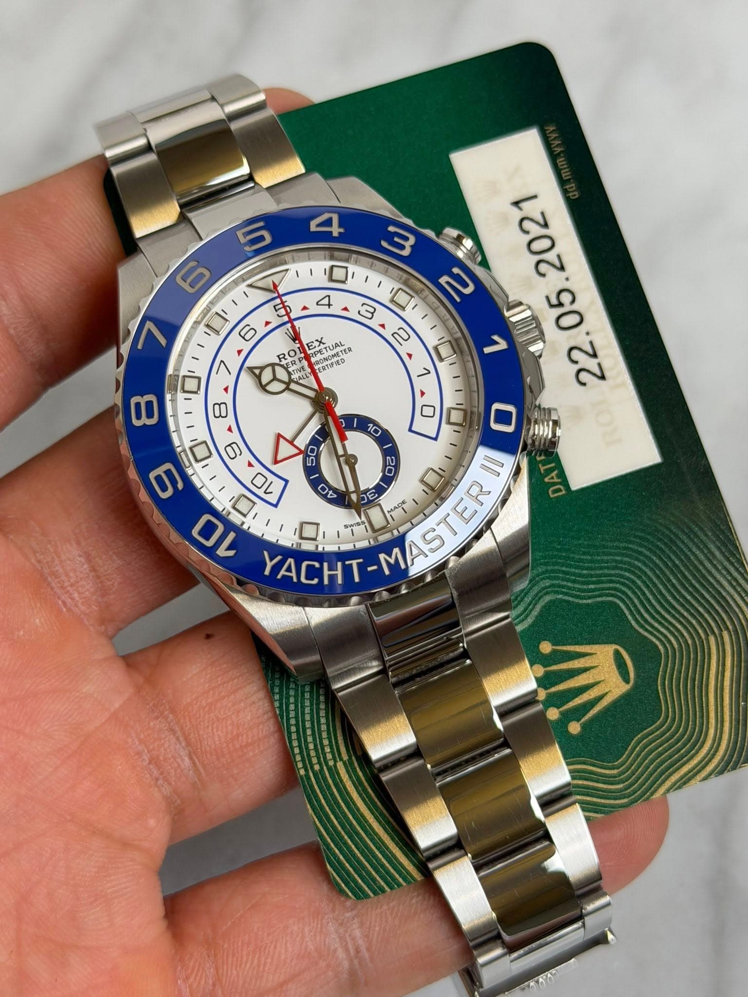 May be an image of wrist watch and text
