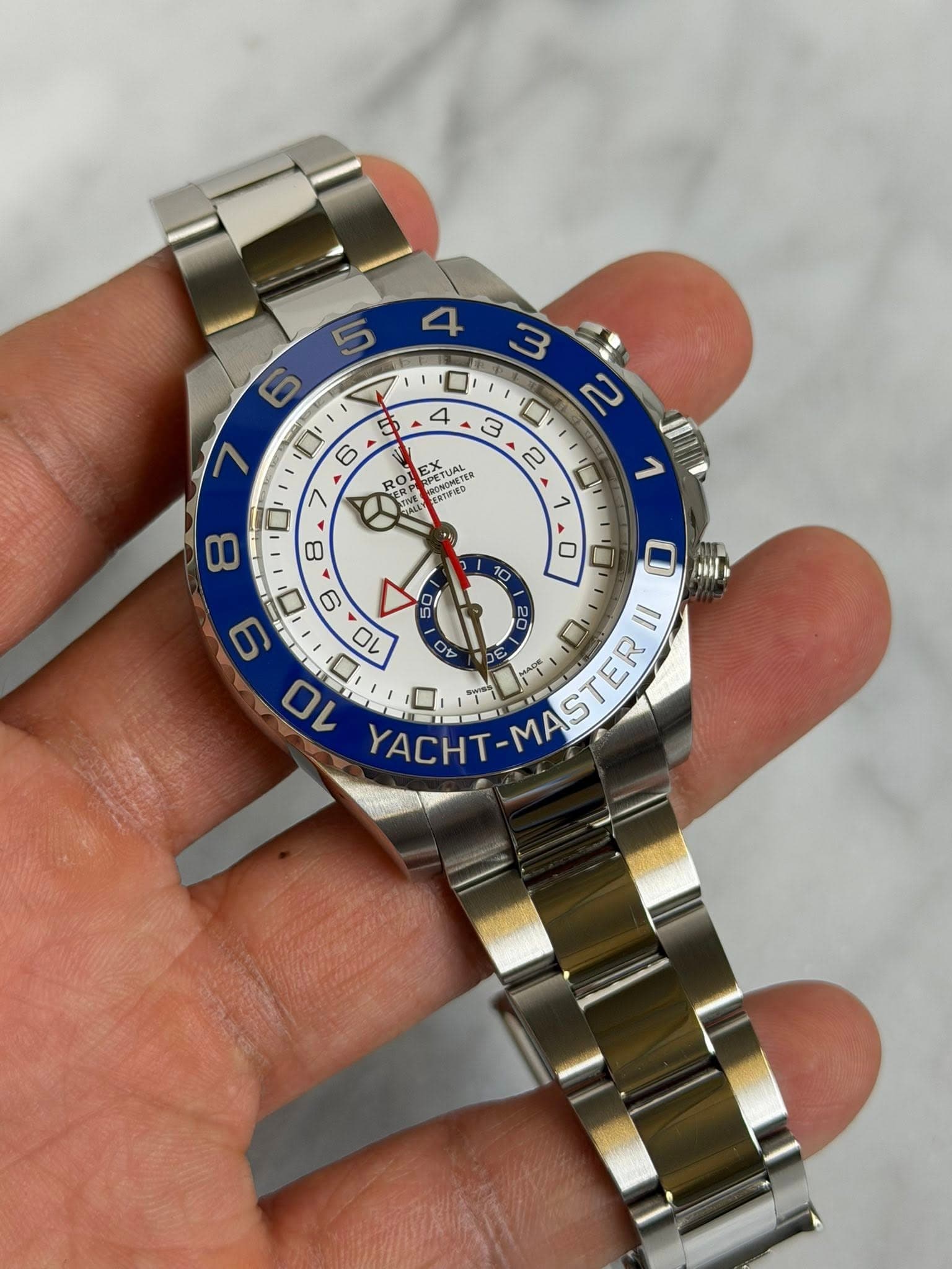 May be an image of wrist watch and text